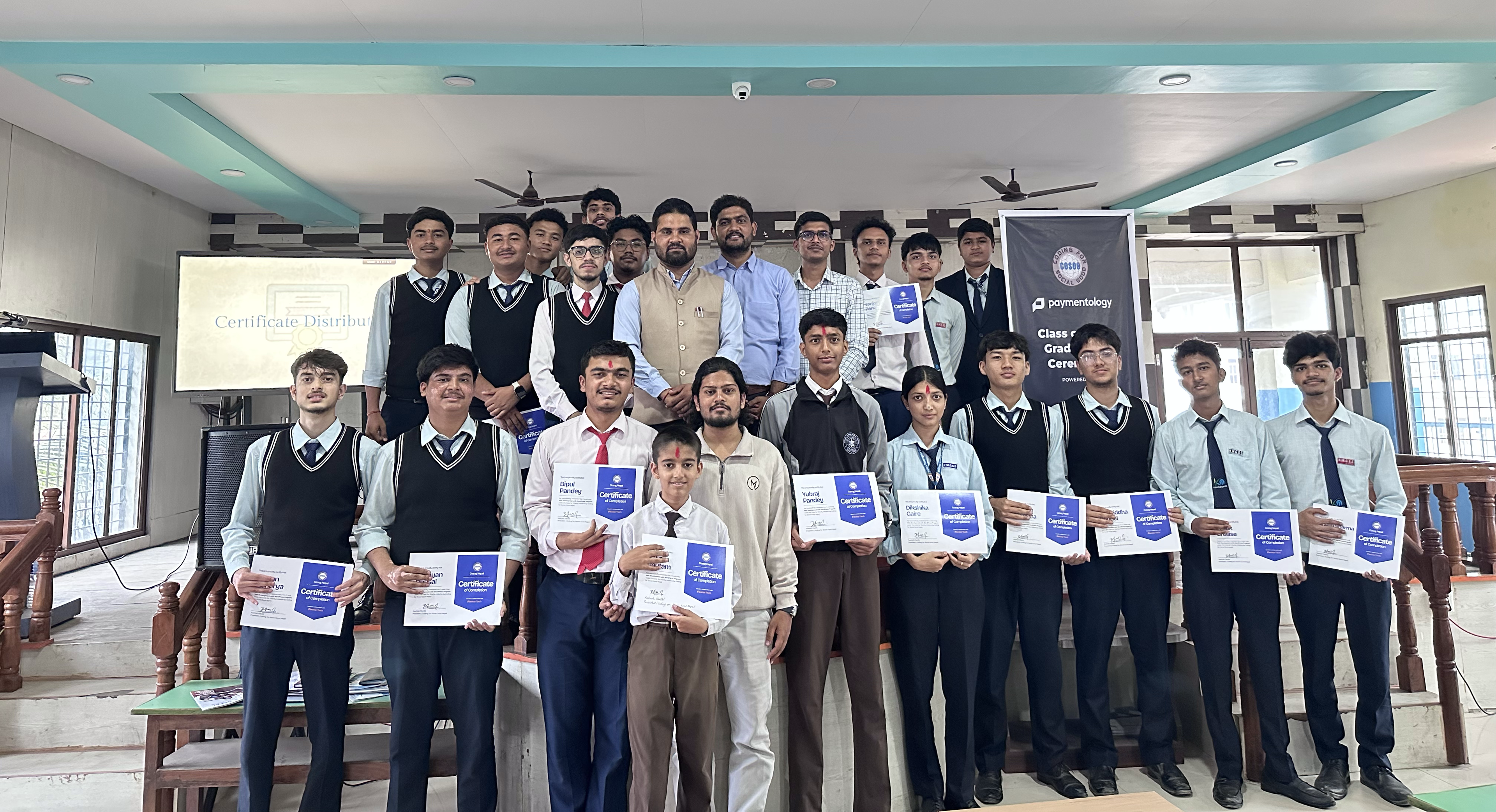 Students at the Web Development with WordPress graduation ceremony at Kalika Manavgyan Secondary School, holding their certificates.